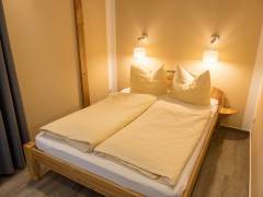 Naturcamp_Ferienwohnung_4Pers_Schlafzimmer2